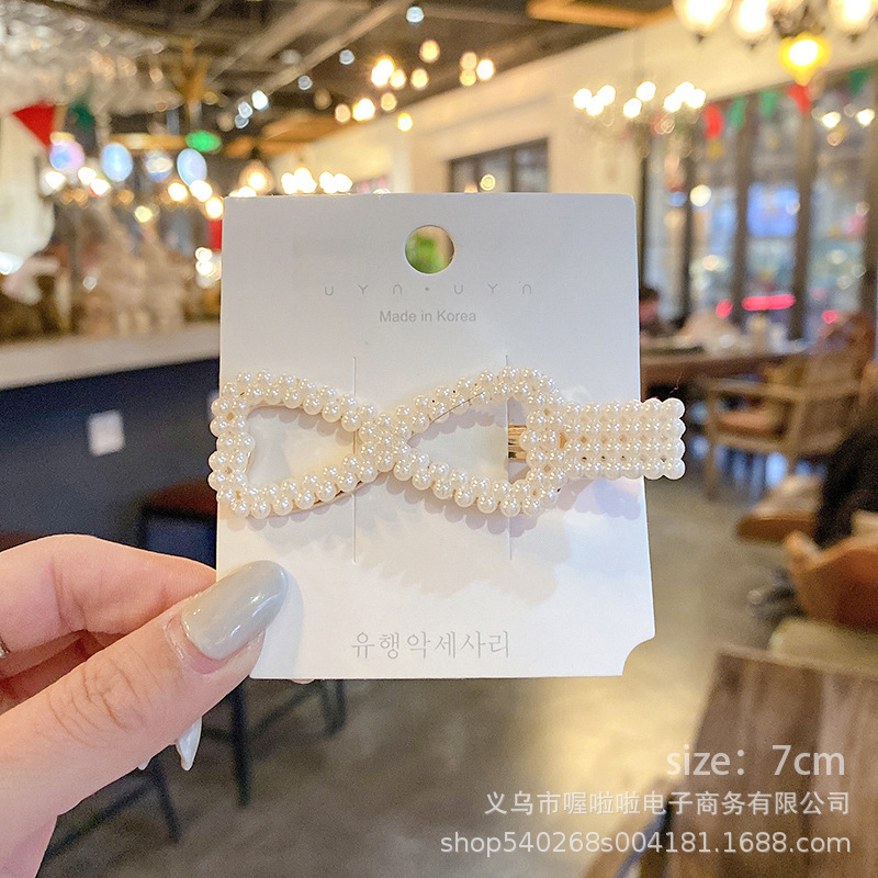 Pasador de pelo de perlas de alta gama estilo francés para mujer, clip para flequillo lateral, elegante clip para el pelo de la frente, accesorio para el pelo tipo pico de pato.