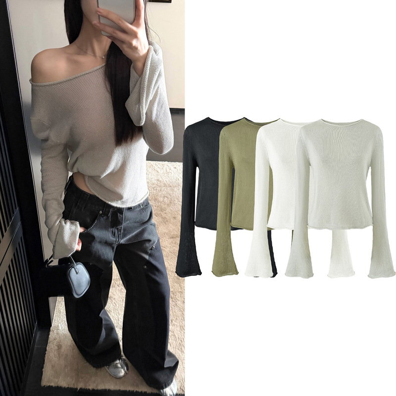Women's short, loose-fitting, round-neck, pullover sweater with slightly flared sleeves, featuring a rolled hem, solid color, thin fabric, and a slightly sheer design Women's short, loose-fitting, round-neck, pullover sweater with slightly flared sleeves, featuring a rolled hem, solid color, thin fabric, and a slightly sheer design