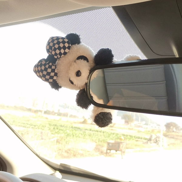 Black and white knot + sitting panda lying on the rearview mirror