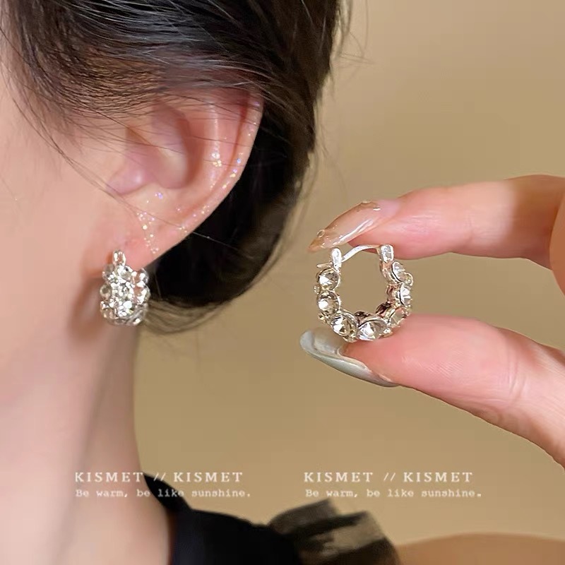 66 # Silver double-sided zirconia oval hoop earrings