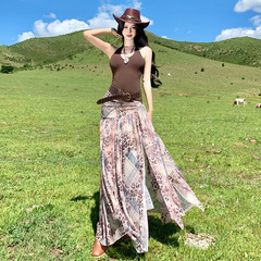 川西风敦煌复古度假露背挂脖连衣裙女秋季设计感拼接豹纹开叉长裙