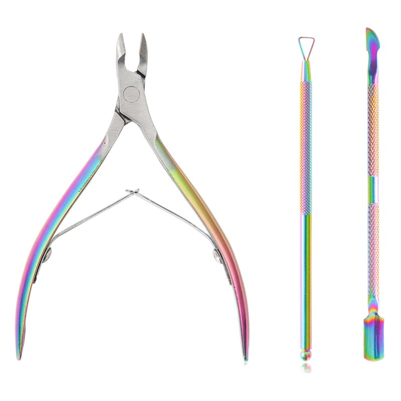 Esmalte de uñas transfronterizo chapado color piel muerta empuje conjunto de tres piezas tijeras de piel muerta pequeño empuje de acero removedor de uñas HERRAMIENTA DE MANICURA