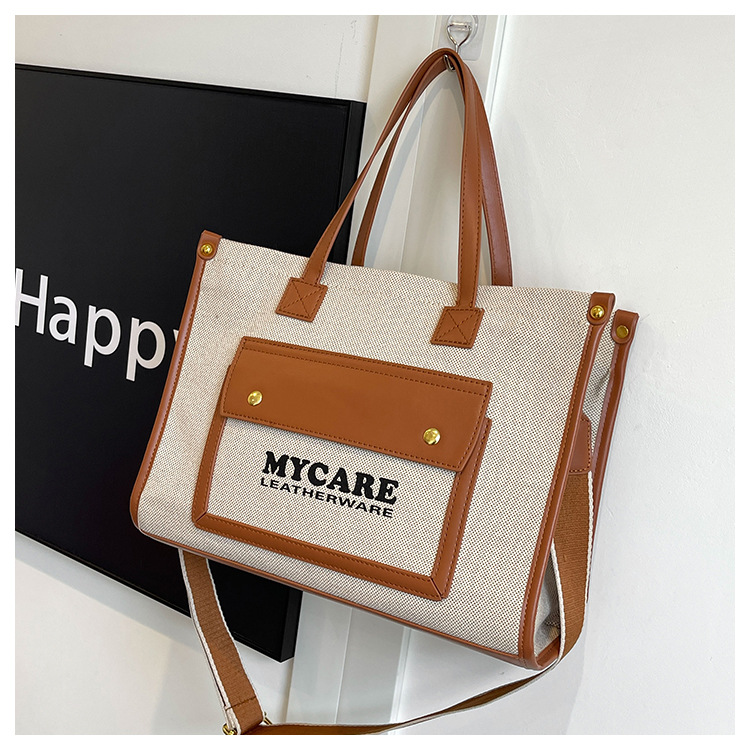 Bolso de lona de gran capacidad para mujeres 2024 nueva moda color contrastante empalme mochila de hombro simple bolsa de mano casual
