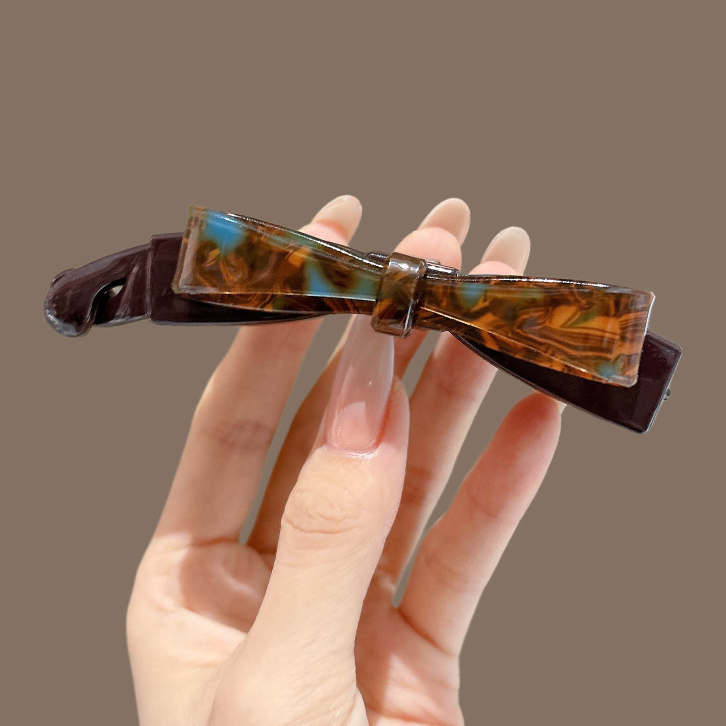 1# blue-brown leopard print bow banana clip, approximately 11cm