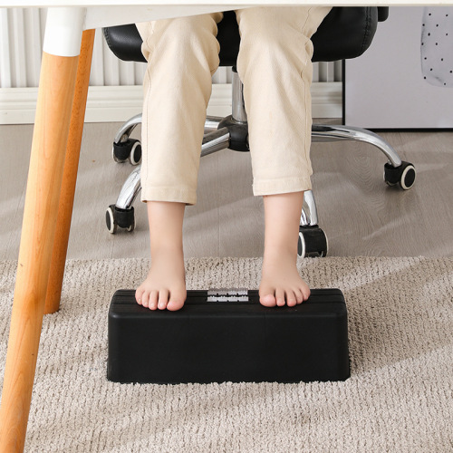 Office foot stool under the table to rest your feet to prevent curling of your legs, a magic tool to step on your feet and put your legs on the stool