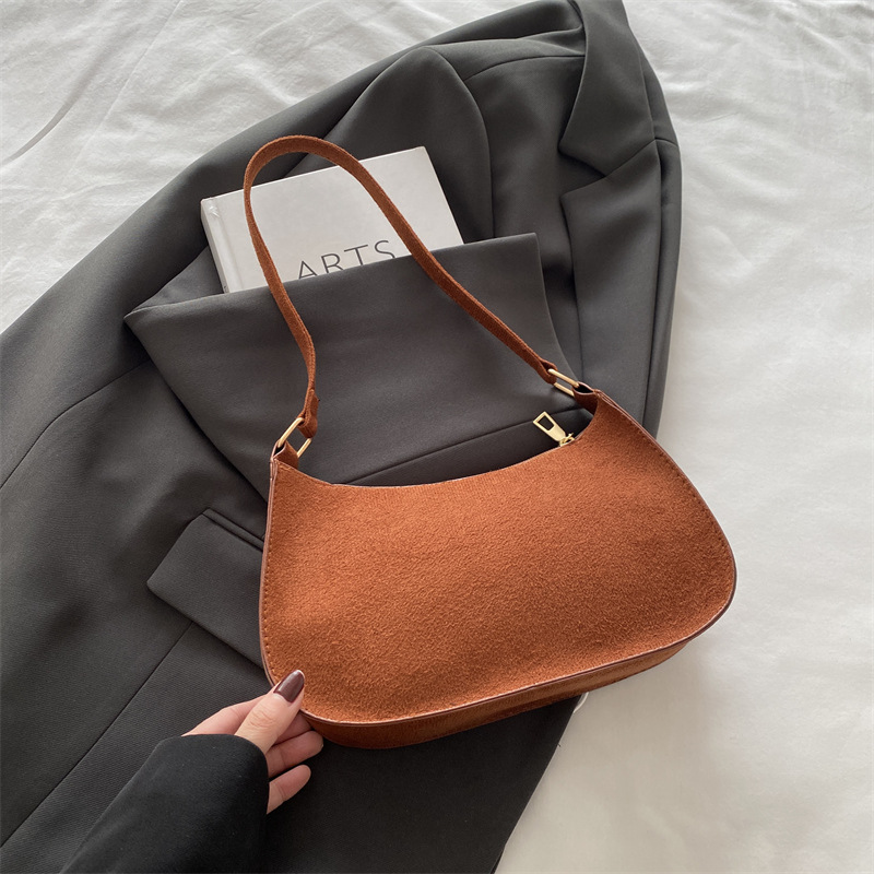 2024 invierno nuevo estilo de nicho de estilo retrógrado diseño de alto valor de la personalidad portátil de hombro de moda casual bolsas axilales