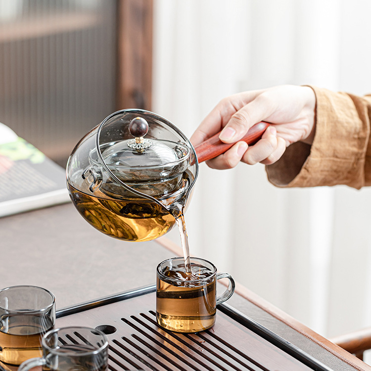 Mango de madera lateral de vidrio de borosilicato olla de ocio 360 ° revestimiento giratorio fabricante de té hogar estufa de cerámica eléctrica tetera