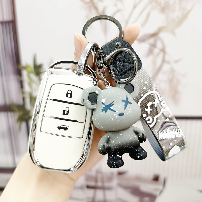 適用豐田鑰匙套凱美瑞卡羅拉漢蘭達汽車雷凌亞洲龍榮放凌尚扣殼女