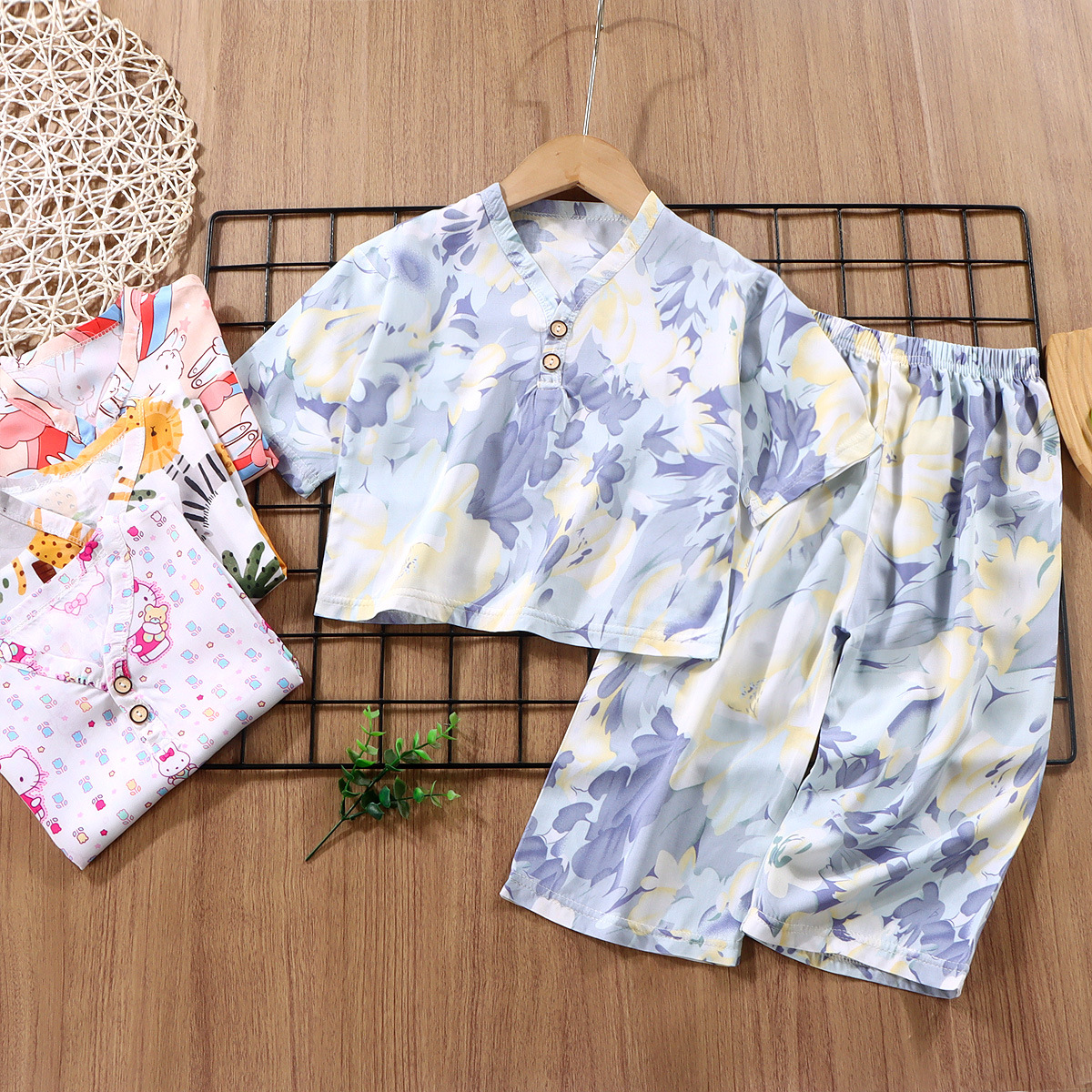Factory wholesale baby summer thin silk suit children's home clothes boys and girls fashion cartoon close-fitting pajamas