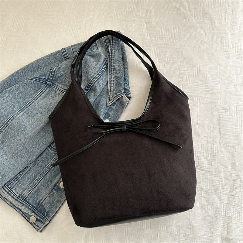 Bolsa de viaje al trabajo para mujeres estilo coreano retro de alta capacidad bolso de brazo 2025 primavera alta sensación bolso de hombro