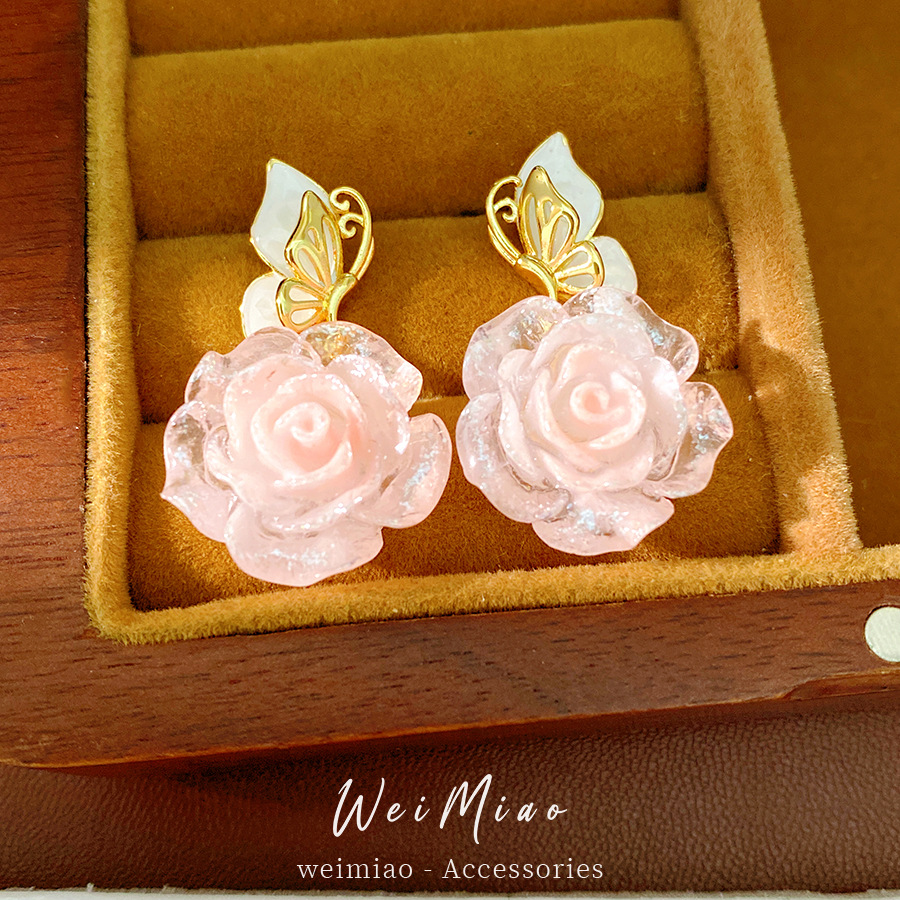 Aguja de plata goteando aceite de resina de mariposa flor pernos de aretes de viento dulce pequeño fresco de vacaciones aretes de aretes de aretes de lujo ligero de alta calidad aretes de aretes