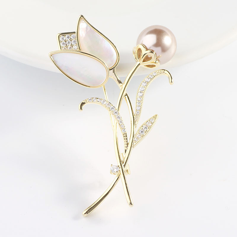 Elegant suit from pearl lapel pin