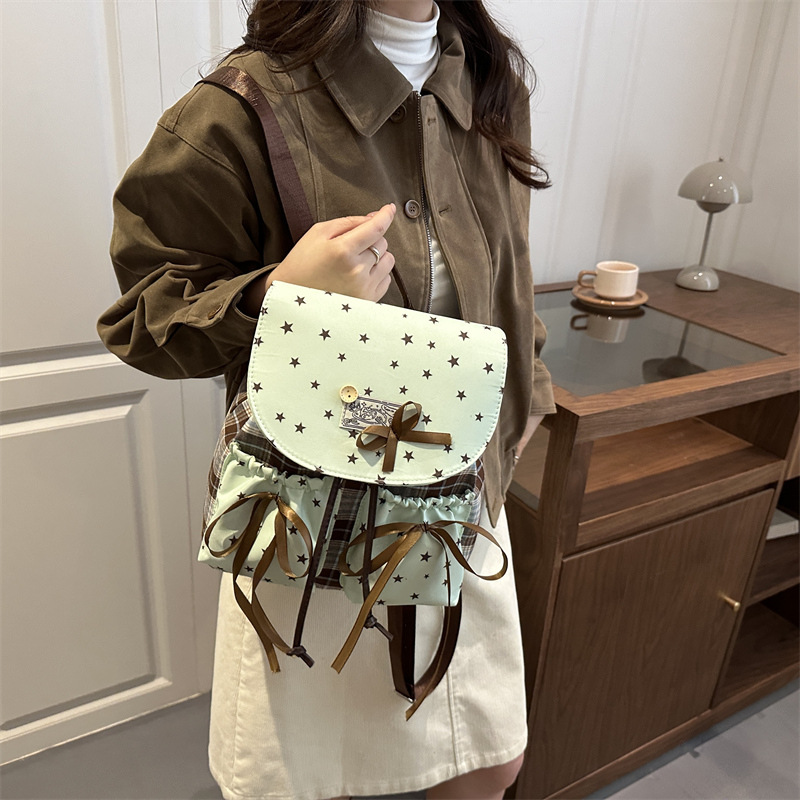 Arco ondulado coreano ins estilo extranjero mochila multifuncional dulce para estudiantes en clase mochila universal