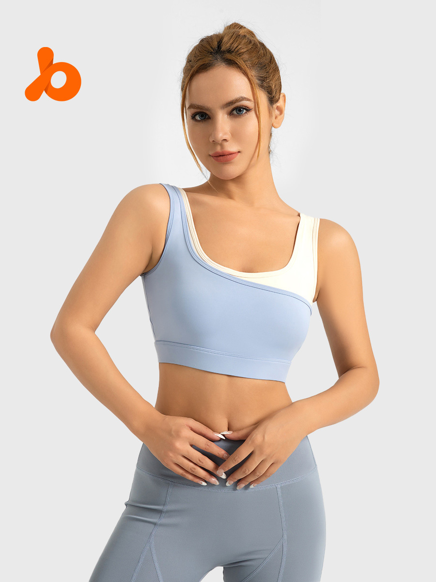 Sujetador deportivo de alta elasticidad con bloques de color para comercio transfronterizo, diseño integrado fijo, a prueba de golpes de alta intensidad, sujetador deportivo push-up en forma de U.