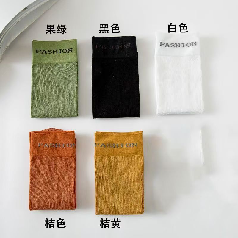 2025 nuevos calcetines de moda personales coreanos de color caramelo primavera y verano calcetines de algodón delgados versátiles calcetines de viento universitarios