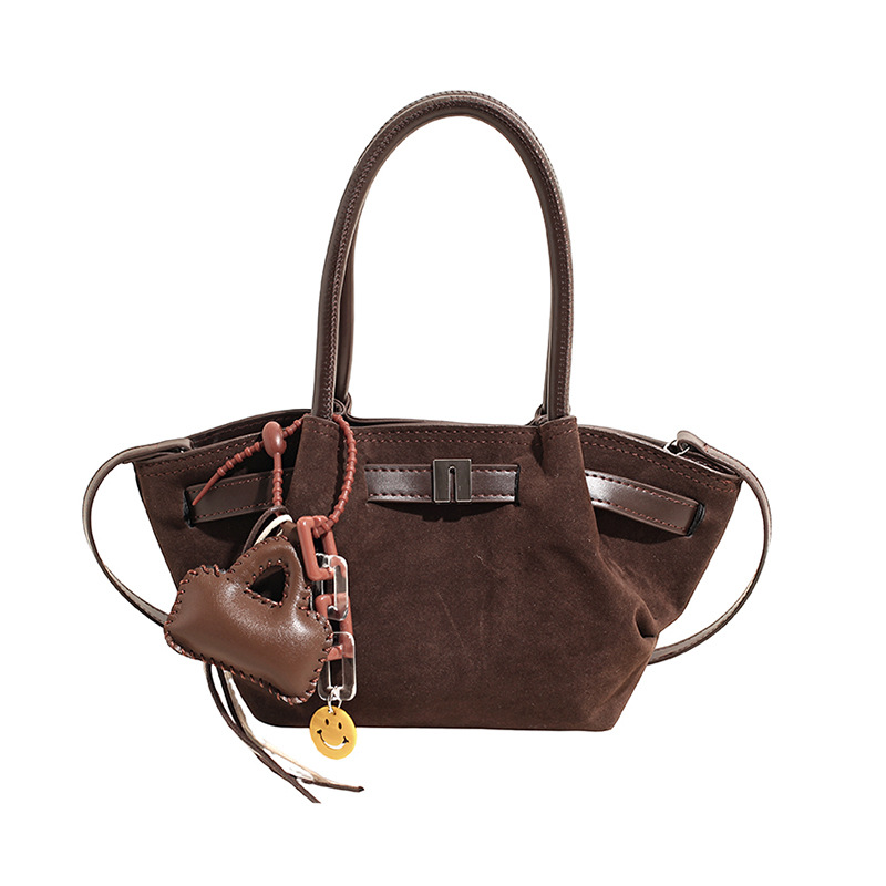 Cestas de platos de mano bolsas de cubo mujeres 2025 nuevo cross-border europeo y americano retro mochila de piel de ciervo esmaltado