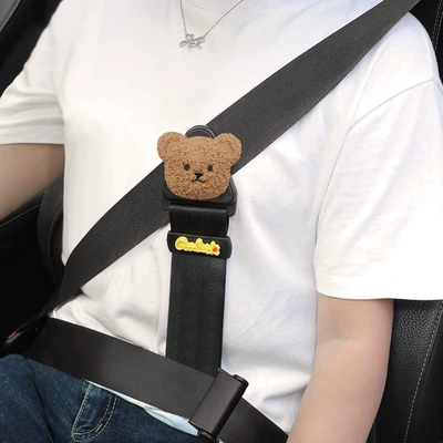 Children's Seat Belt Adjustment: Seat belt shoulder pad