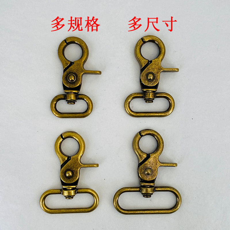 卸売り亜鉛合金の犬のボタンは金属の部品の肩を包んで古銅色のボタンのリボンを掛けます。|undefined