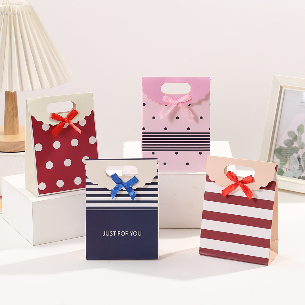 Estilo coreano simple arco bolsa de regalo a rayas color impresión Blanco Bolsa de cartón postre leche té bolso de embalaje