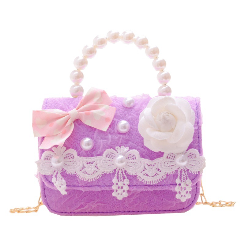 Bolsa para niños bolsa de mensajero de aire exterior 2022 nueva niña moda linda princesa bolsa de hombro pequeña fragancia bolso
