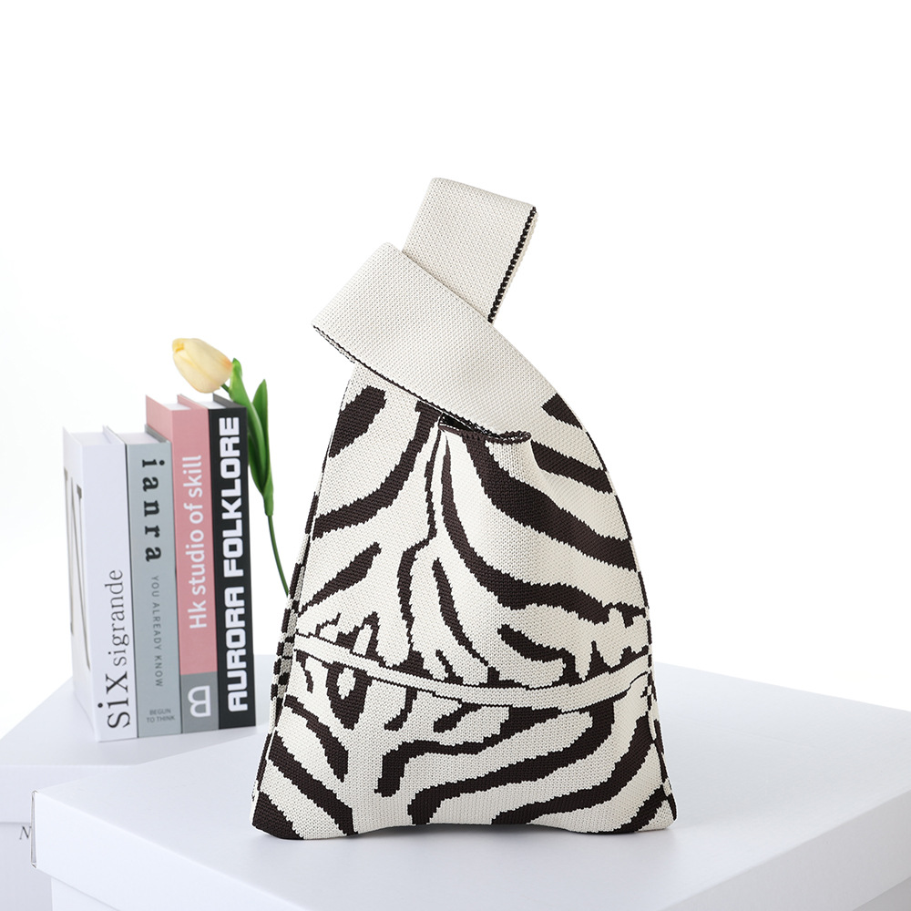 2024 Flying Weaving Bag Tote Bag Versión coreana del nuevo bolso de mano de moda Fabricante de bolsas de compras casuales de gran capacidad para estudiantes