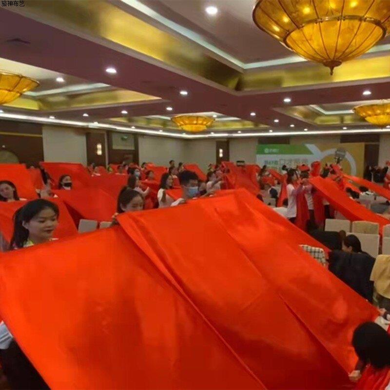 Patriotic dance, red ribbons, colorful ribbons, flowing red silk cloth, sports meet props, ethnic dance red cloth