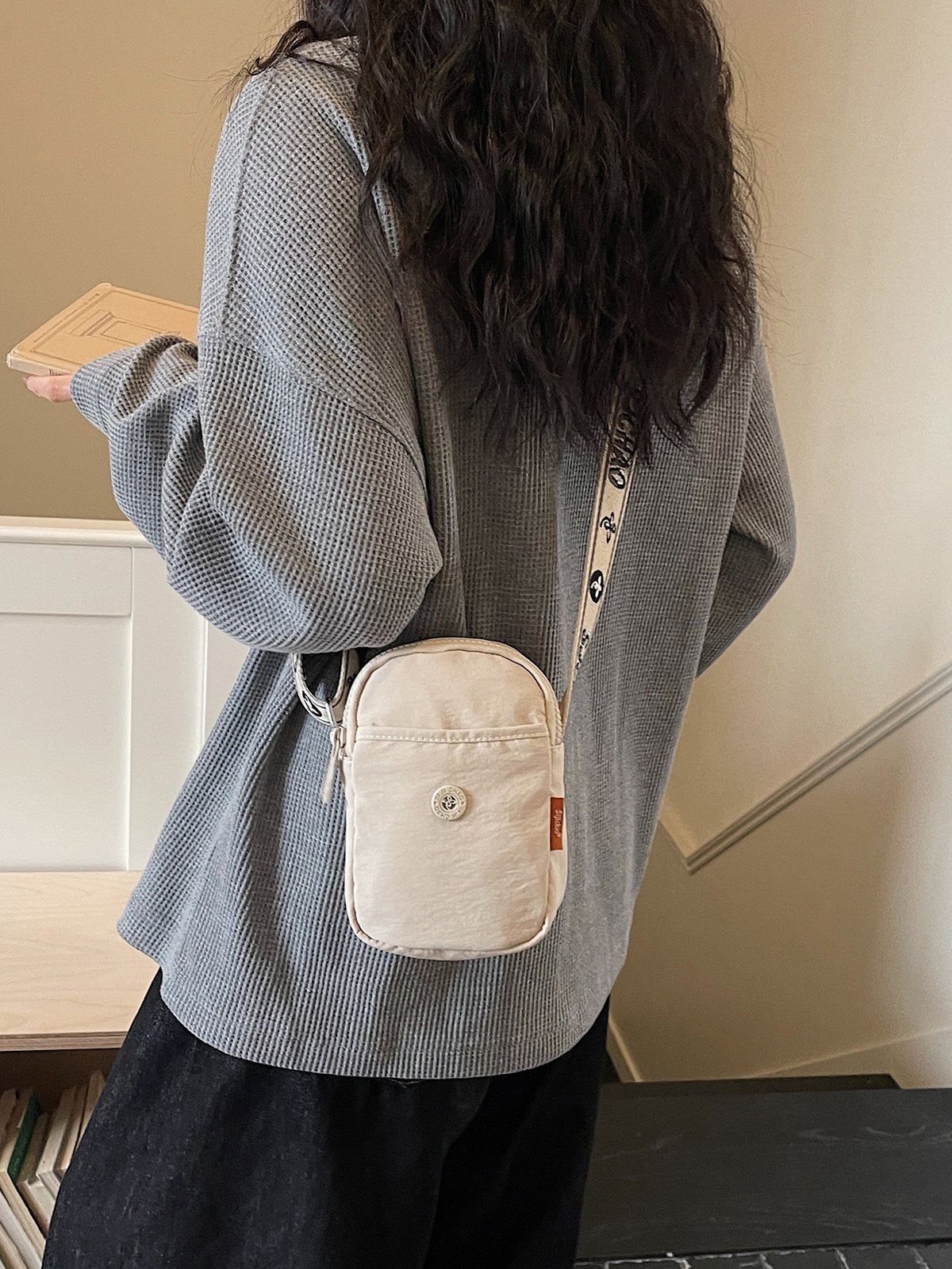 Bolso de nylon de moda para mujeres 2026 nuevo bolso de teléfono móvil ligero casual simple bolso de transporte de viaje