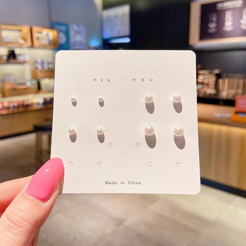 Juego de pendientes 2025 nuevas mujeres de moda simples, compactas, exquisitas, de alta gama, pendientes de celebridades de Internet