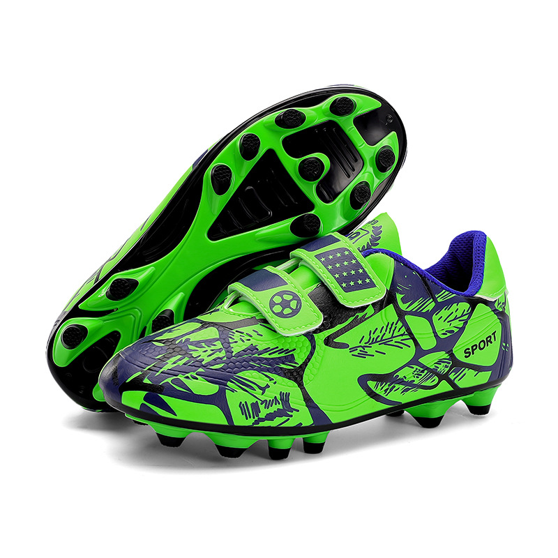 Niños y niñas transfronterizos transpirables cómodos deportes ociosos bajos clavos de clavos de hierba competición zapatos de fútbol de fábrica para niños