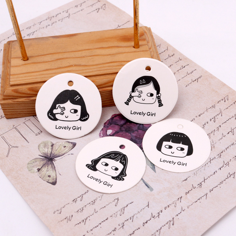 厂家现货2021新款小号创意圆形可爱女孩儿童服装吊牌混装发