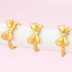 Gold-plated brass open bow ring, South Sea gold adjustable finger ring, simple and elegant women's style, direct supply
