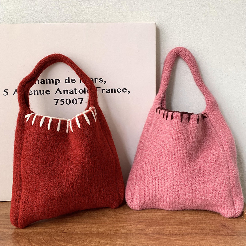 Bolsas de punto otoño y invierno nueva atmósfera bolsas de cesta de verduras bolsas de tejido a mano bolsas de lana de moda bolsas de hombro