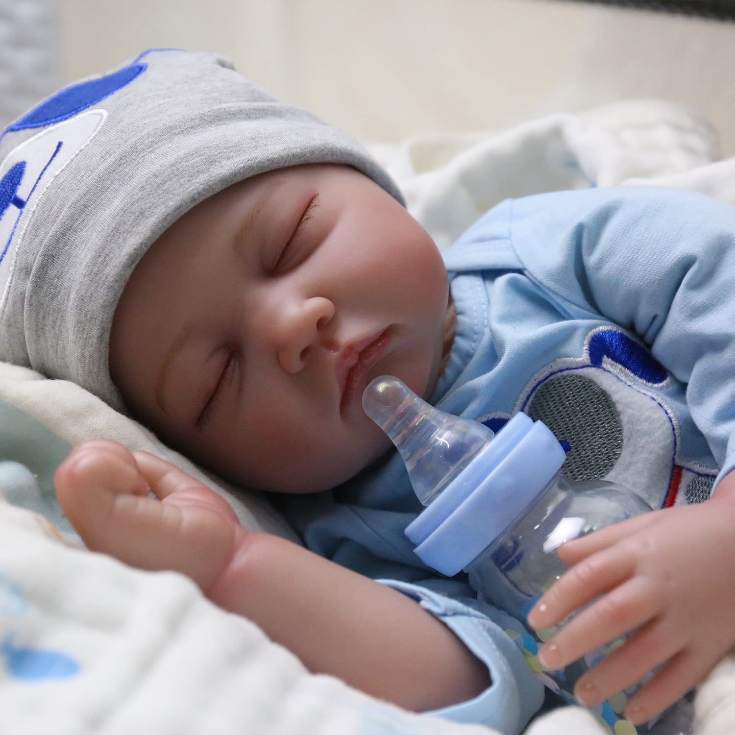 Cambiar juguetes de goma blanda una muñeca transfronteriza de 55cm puede simular muñecas bebés pesados muñecas de cabello Henghua