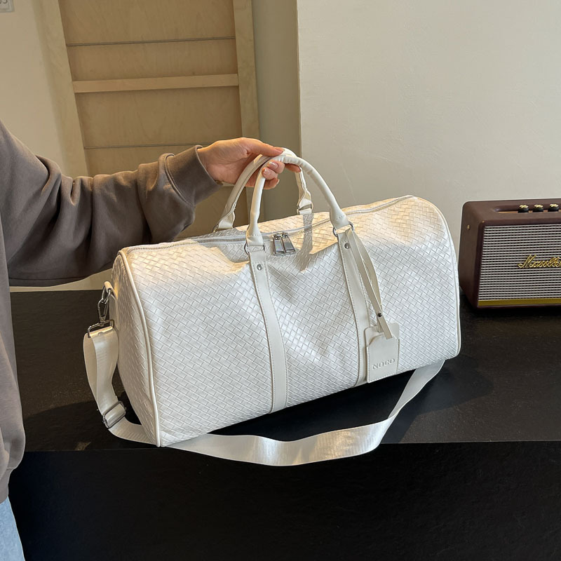 Bolso de viaje de cuero tejido de PU transfronterizo bolsa de equipaje de gran capacidad de corta distancia bolsa de gimnasio de yoga de mensajero de todo fósforo