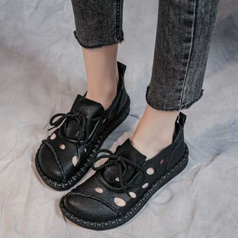 2026 nuevo tamaño de lazos delanteros de alta calidad retro sandálias romanas con base plana agujero agujero zapatos sandalias mujeres
