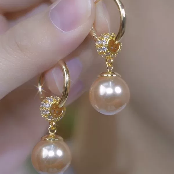 Internet Celebrity Explosive Champagne Pearl Tassel Ear Buckle Women's Autumn and Winter Light Luxury Elegant High-end Sense Face Skinny All-match Earrings