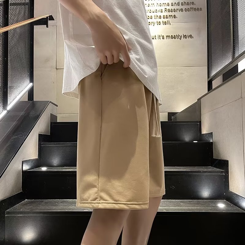 Marca de moda ins pantalones cortos casuales de verano para hombres estilo caliente holgado tendencia casual ropa exterior pantalones de cinco puntos de estilo coreano de todo fósforo