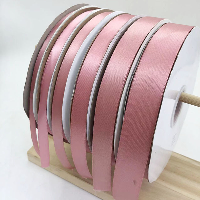 Un solo lado de poliéster cifrado cinta de boda festiva embalaje cinta accesorios de ropa 161 lotus polvo cinta de color fábrica al por mayor