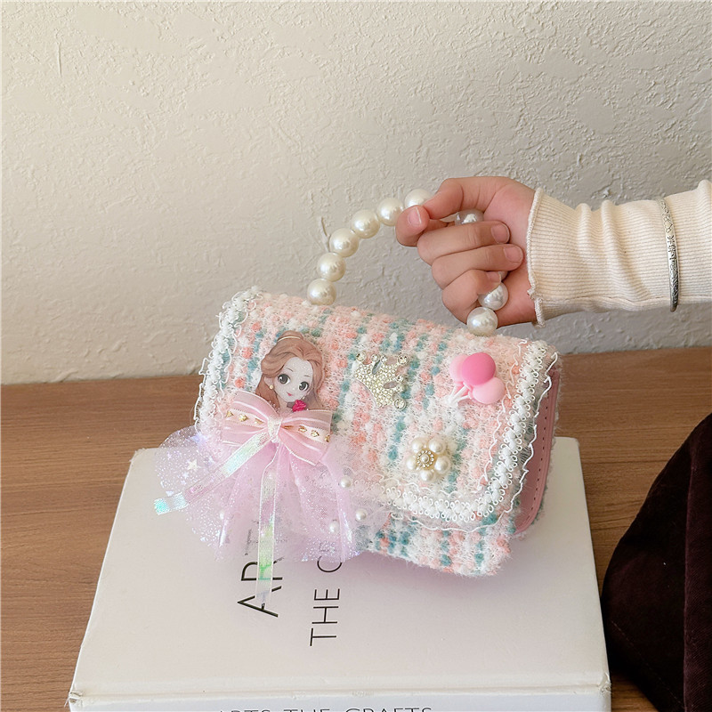 Bagos de mano de perlas para niños 2024 Año Nuevo muñecas de lana accesorios bolsos de hombro lindas chicas bolsos de mano