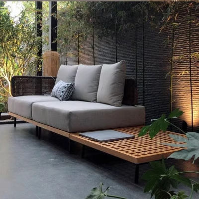 Sofá al aire libre Diseñador de patio hotel sofá de caña muebles al aire libre de caña balcón sofá de madera maciza