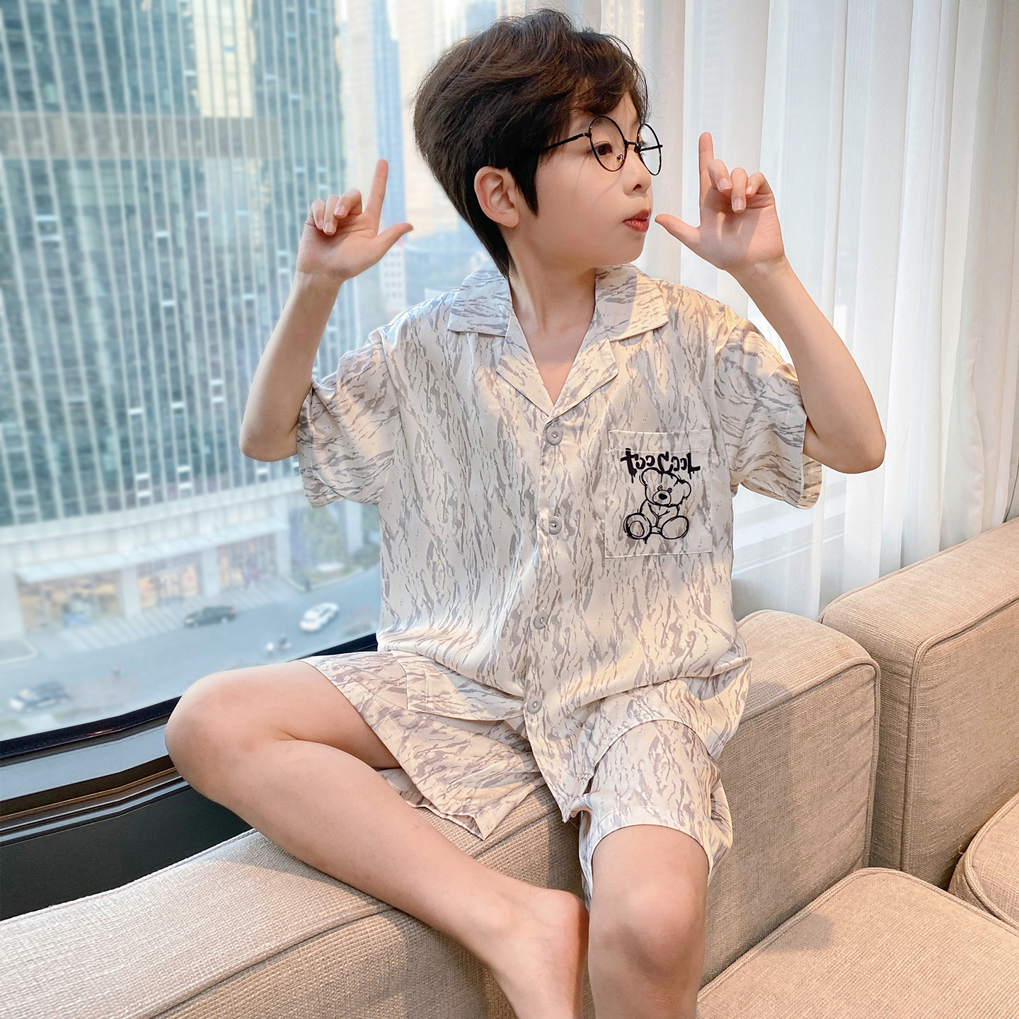 Pijamas infantiles verano 2026 nuevo niño hielo delgado de manga corta juveniles niños grandes set de ropa para el hogar