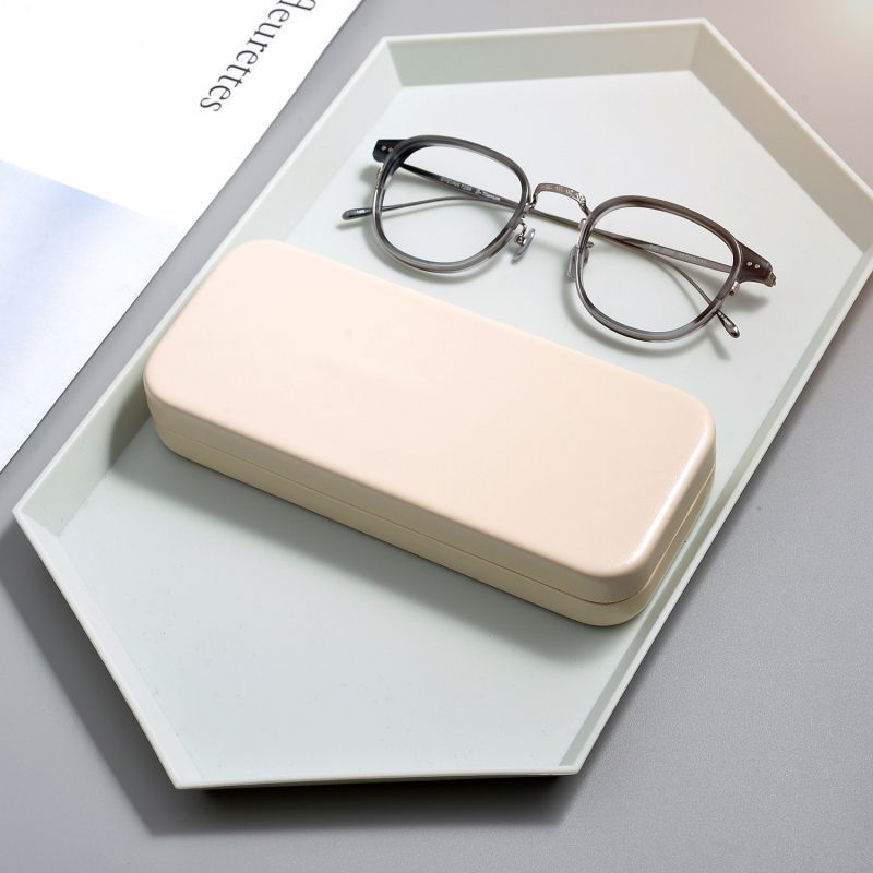 Caja de gafas simple para hombres y mujeres estilo retrógrado estilo portátil anti-presión viaje miopía gafas caja de cáscara