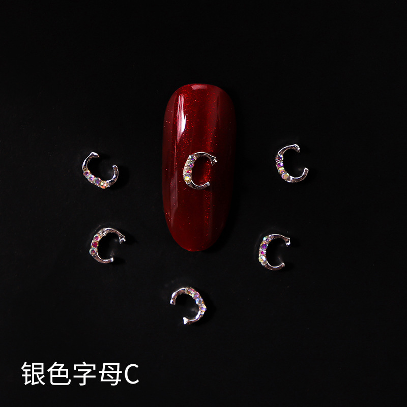 Nueva LZ manicura 26 letras aleación joyería estilo japonés Internet celebridad plata letras manicura joyería clavo Taladro
