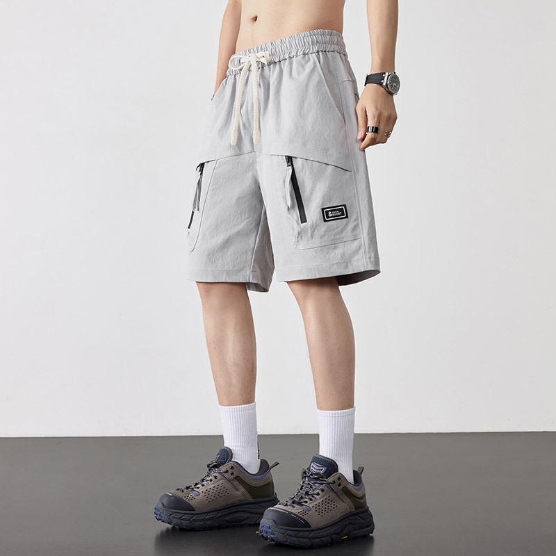 Pantalones cortos de algodón para hombres de verano nueva tendencia coreana pantalones largos de piernas anchas de tamaño grande para aumentar los pantalones cortos para hombres