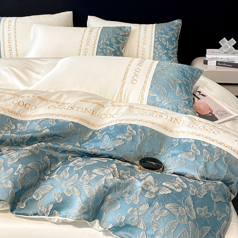 Juego de cuatro piezas de cama jacquard de seda de hielo de verano 2025 nueva funda de edredón de sábana fresca ropa de cama de alta gama de lujo ligero