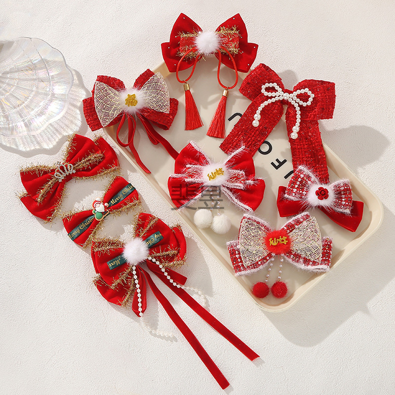 festive red pendant with bow
