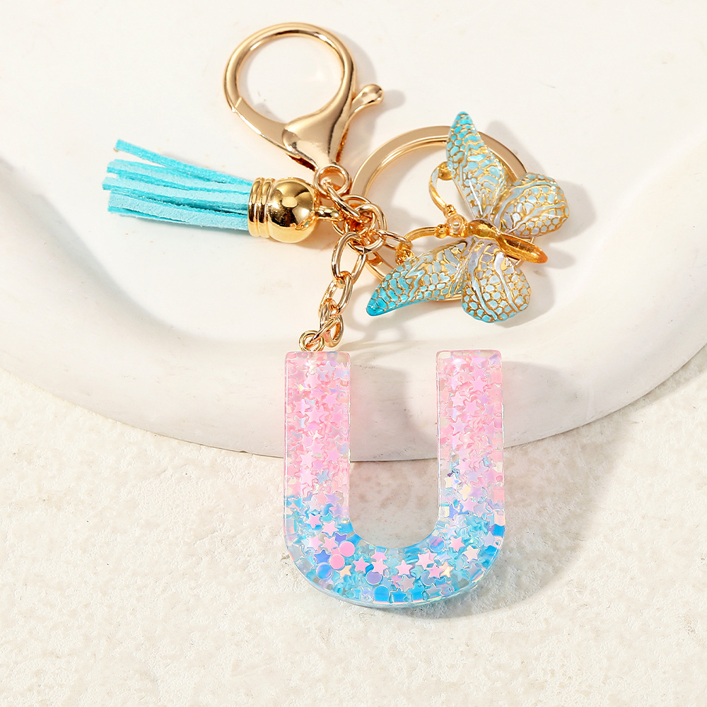 Europa y los Estados Unidos transfronterizos nuevos cristal sequinado goteo de goma letras inglesas joyería llavero y bolsos colgante apoyo al por mayor