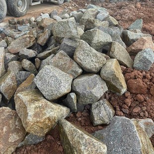 Masonry wall stone base wall stone rubble stone rubble stone garden flower bed earth retaining stone stone stone foundation stone
