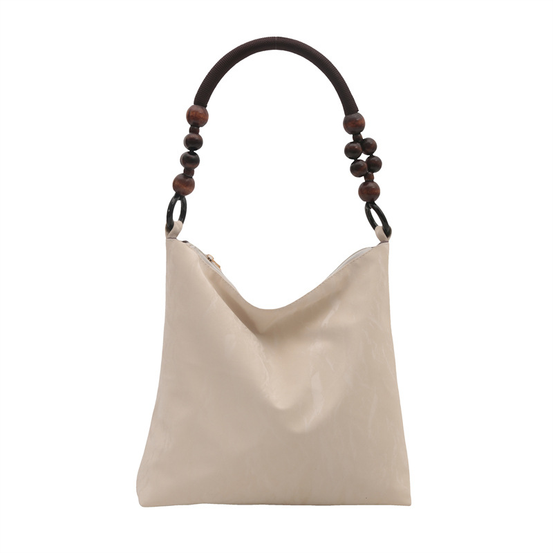Nueva bolsa de estilo chino para mujeres 2024 verano nuevo estilo simple de moda seda bolso inferior nicho universal bolso de hombro casual