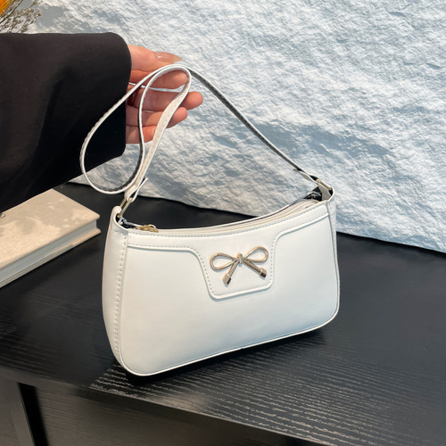 Fashion butterfly knot 2025 solid color Korean version trendy quality stylish commuting shoulder underarm baguette bag for women